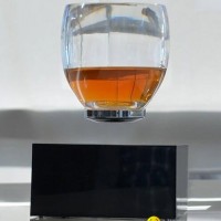 360 rotating square base wirless magnetic floating water cup