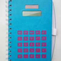 70 pages of notebook with calculator and pen