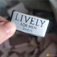 Custom embossed shinny silver adhesive label for perfume bottle